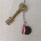 Birillo allegro "come il Tuo Pelosetto" portachiavi - Zampettiamo